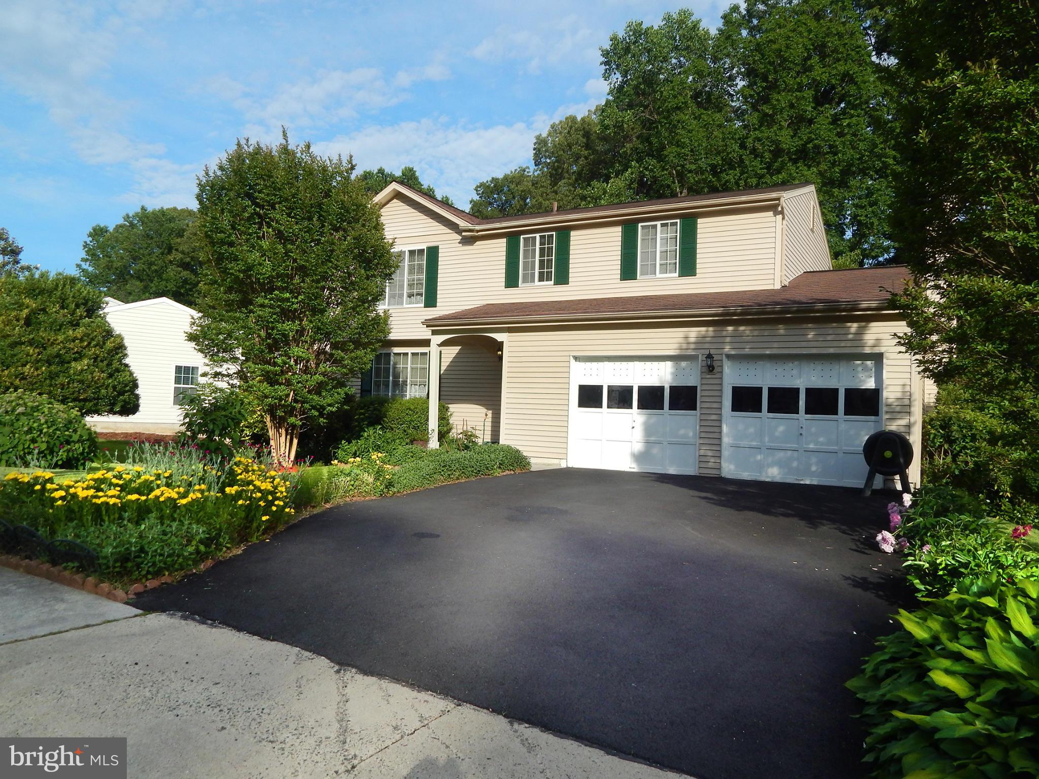 5776 Heming Avenue Springfield, VA 22151 - Photo 2 of 25 front view of a house with a street