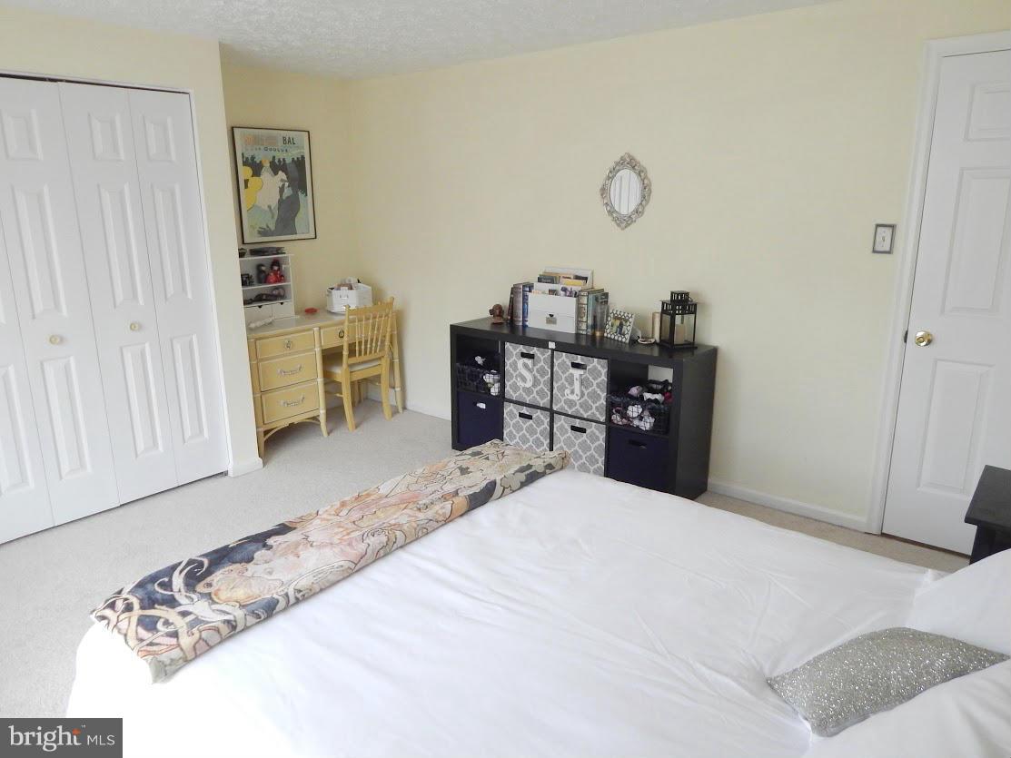5776 Heming Avenue Springfield, VA 22151 - Photo 21 of 25 a room with a bed and a cabinets