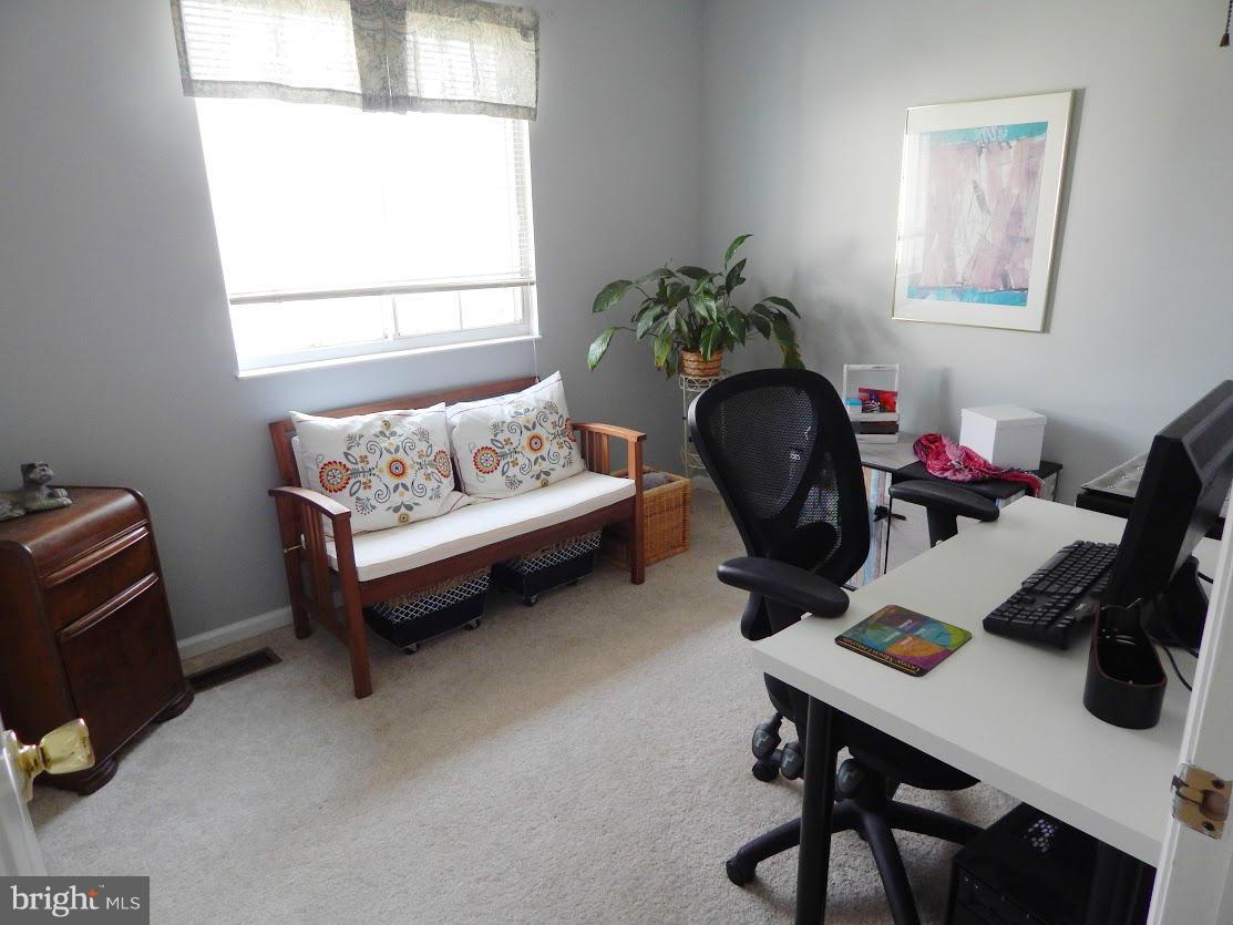 5776 Heming Avenue Springfield, VA 22151 - Photo 23 of 25 a living room with furniture and a window