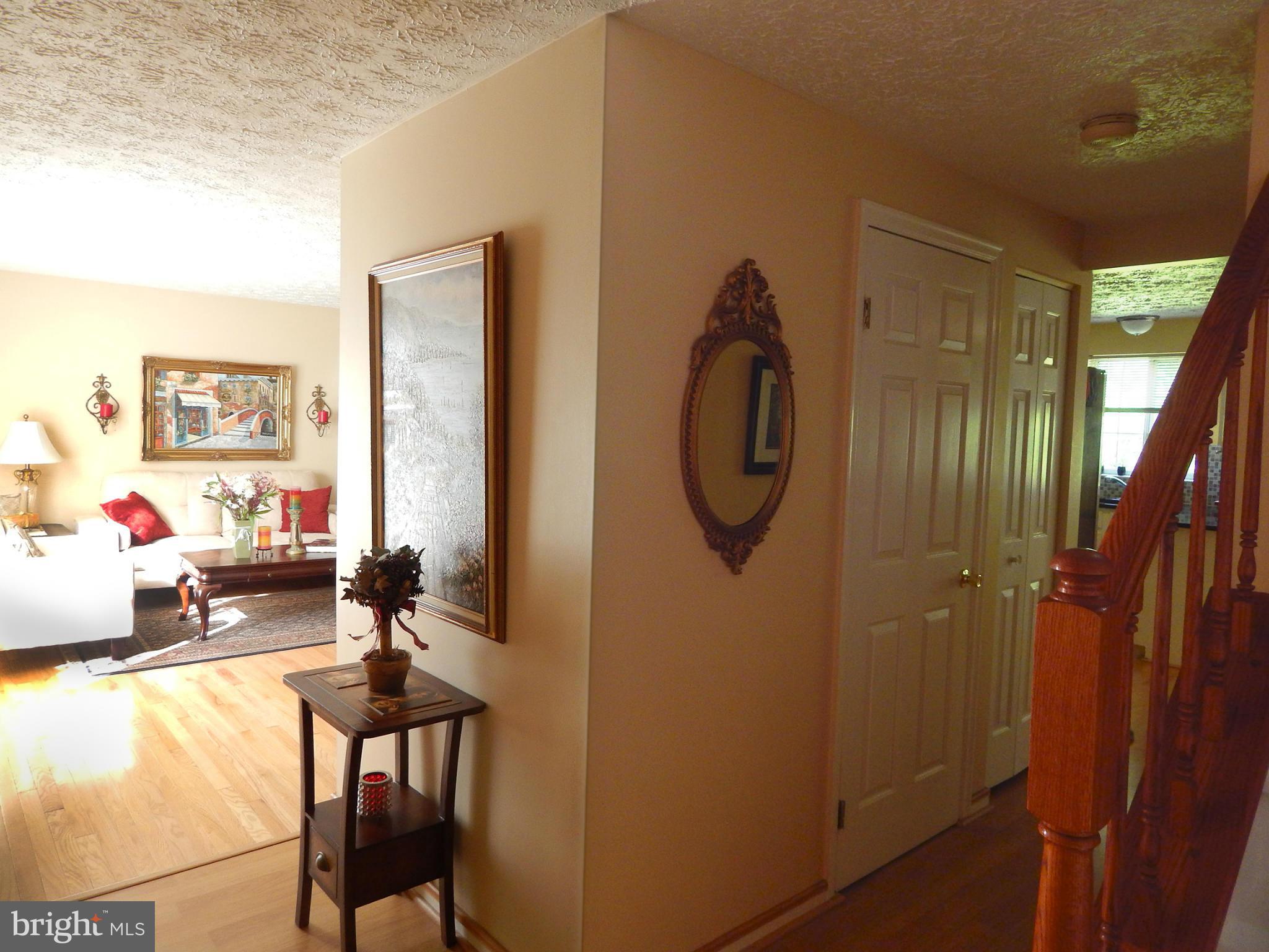 5776 Heming Avenue Springfield, VA 22151 - Photo 4 of 25 a very nice looking room with a large mirror and a sink