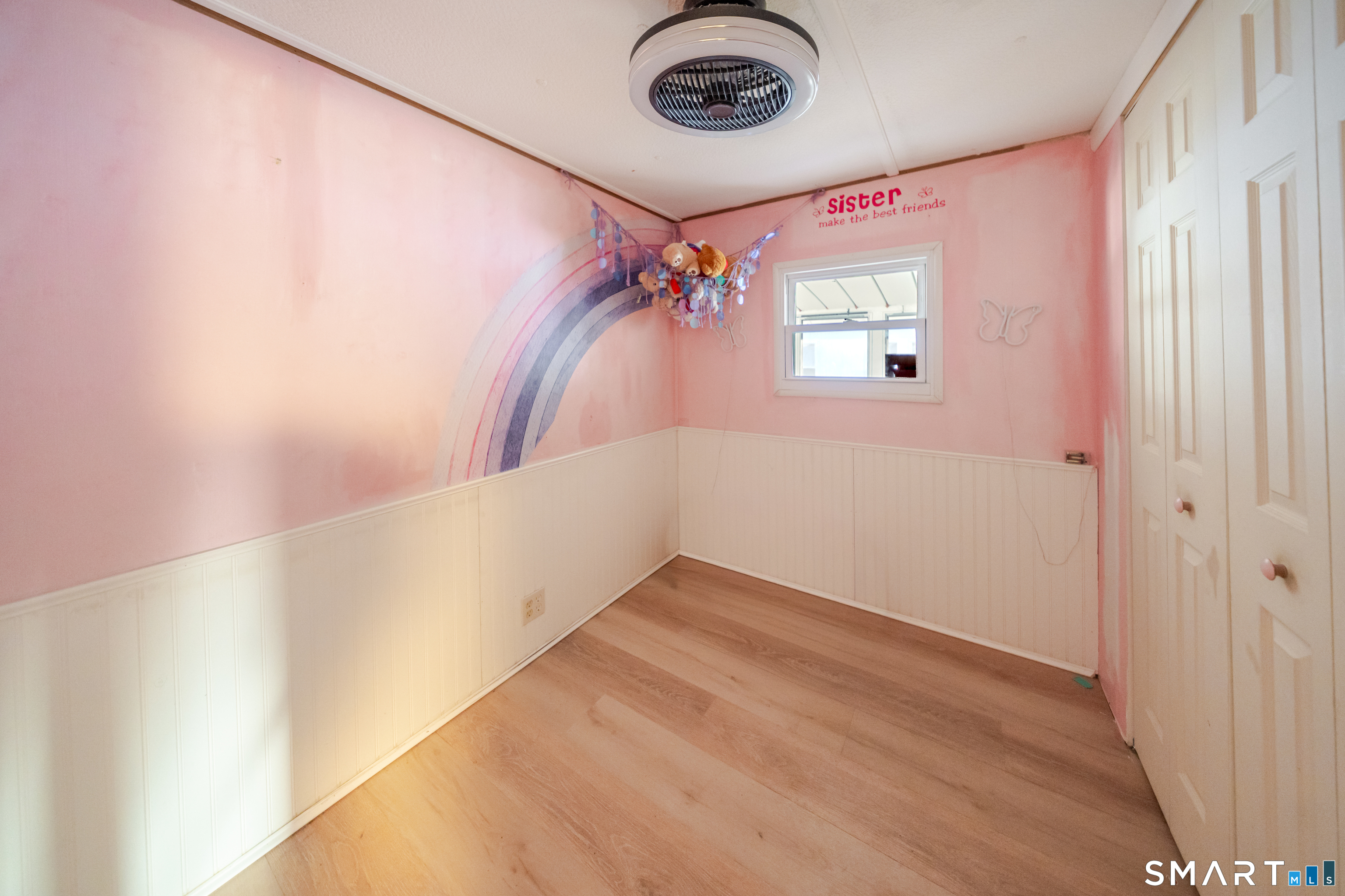 93 Shawnee Road East Hartford, CT 06118 - Photo 29 of 37 a view of a hallway with a chandelier