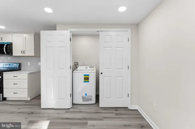 a view of a storage & utility room with closet