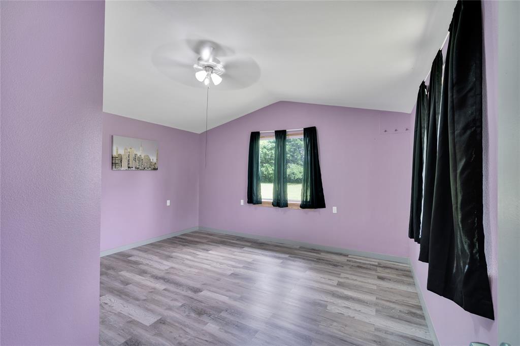 10476 County Road 313 Terrell, TX 75161 - Photo 22 of 40 a view of an empty room with a window