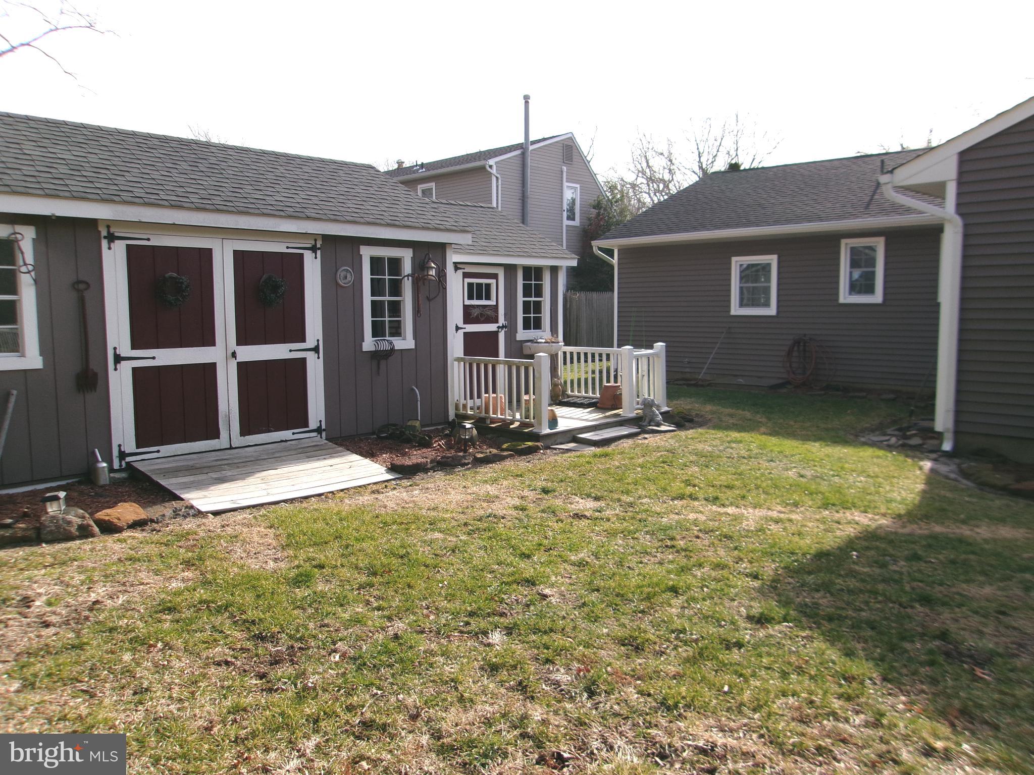 22 Nugentown Road Tuckerton, NJ 08087 - Photo 21 of 37 front view of a house with yard