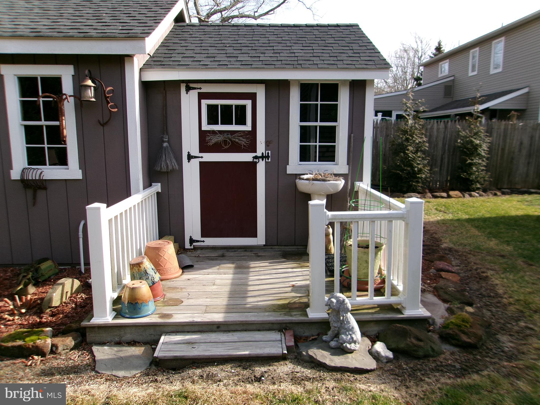 22 Nugentown Road Tuckerton, NJ 08087 - Photo 22 of 37 a front view of a house with garden