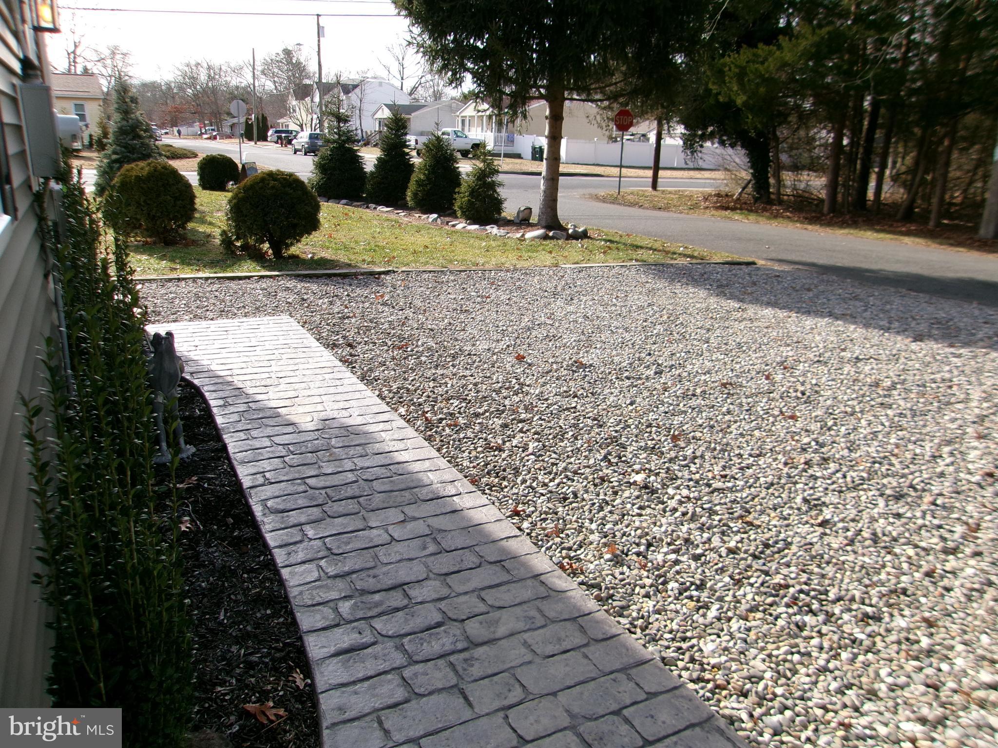 22 Nugentown Road Tuckerton, NJ 08087 - Photo 27 of 37 a view of a yard with plants