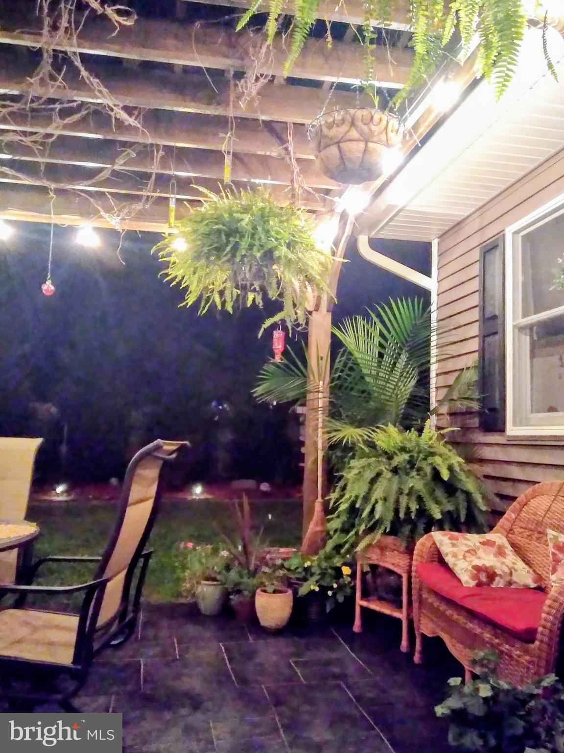 22 Nugentown Road Tuckerton, NJ 08087 - Photo 35 of 37 a backyard of a house with a table and chairs