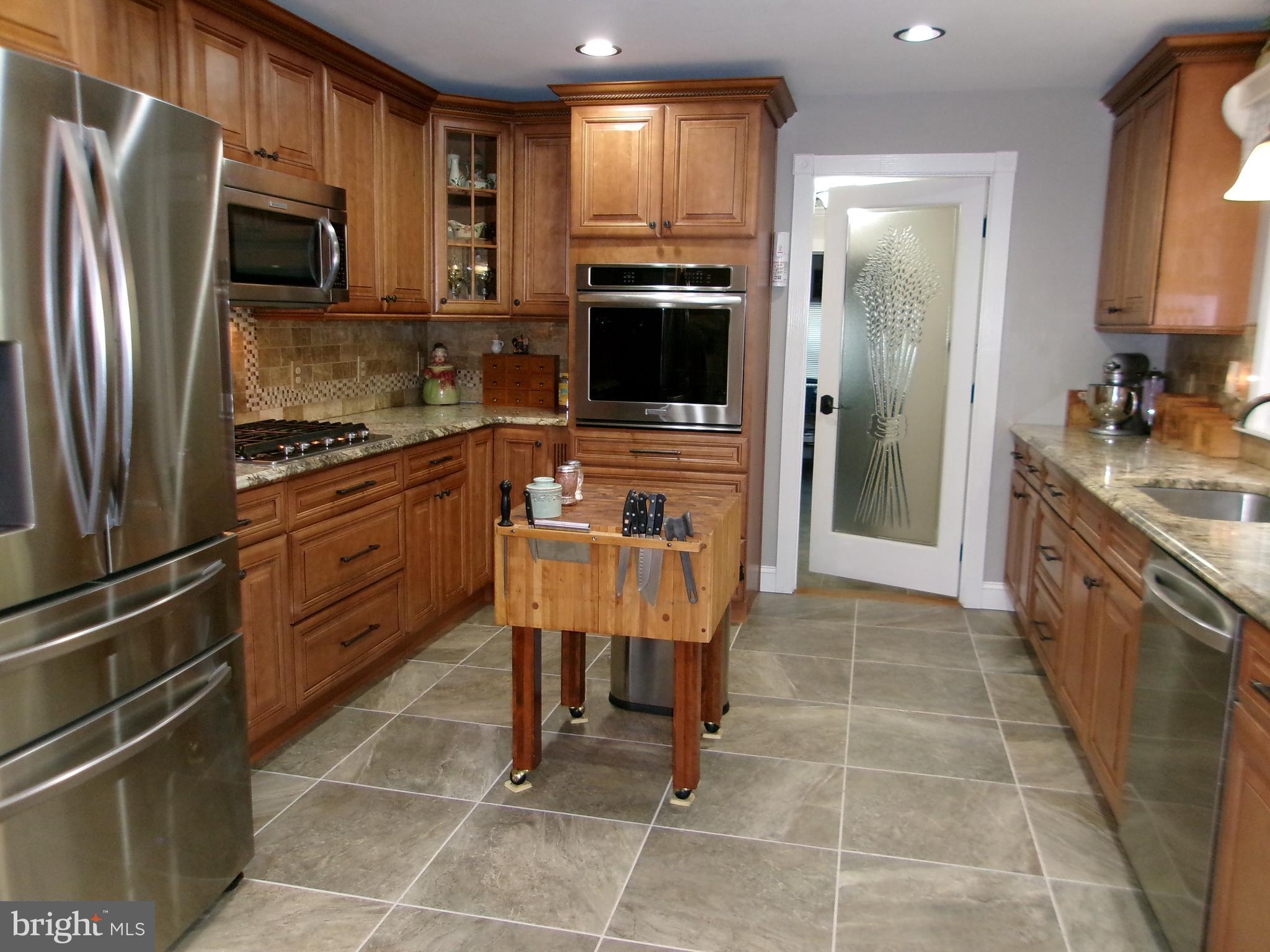 22 Nugentown Road Tuckerton, NJ 08087 - Photo 8 of 37 a kitchen with stainless steel appliances granite countertop a refrigerator stove and sink