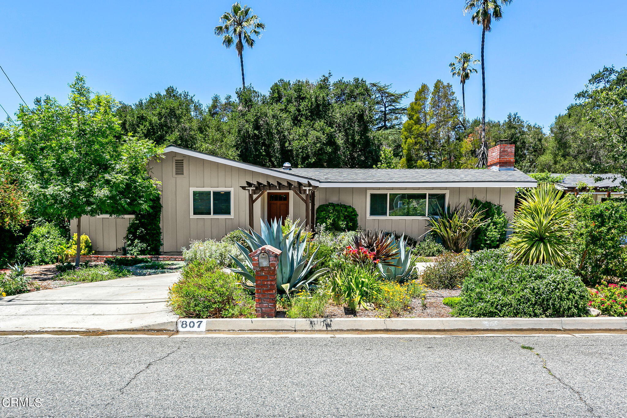front view of a house with a small yard
