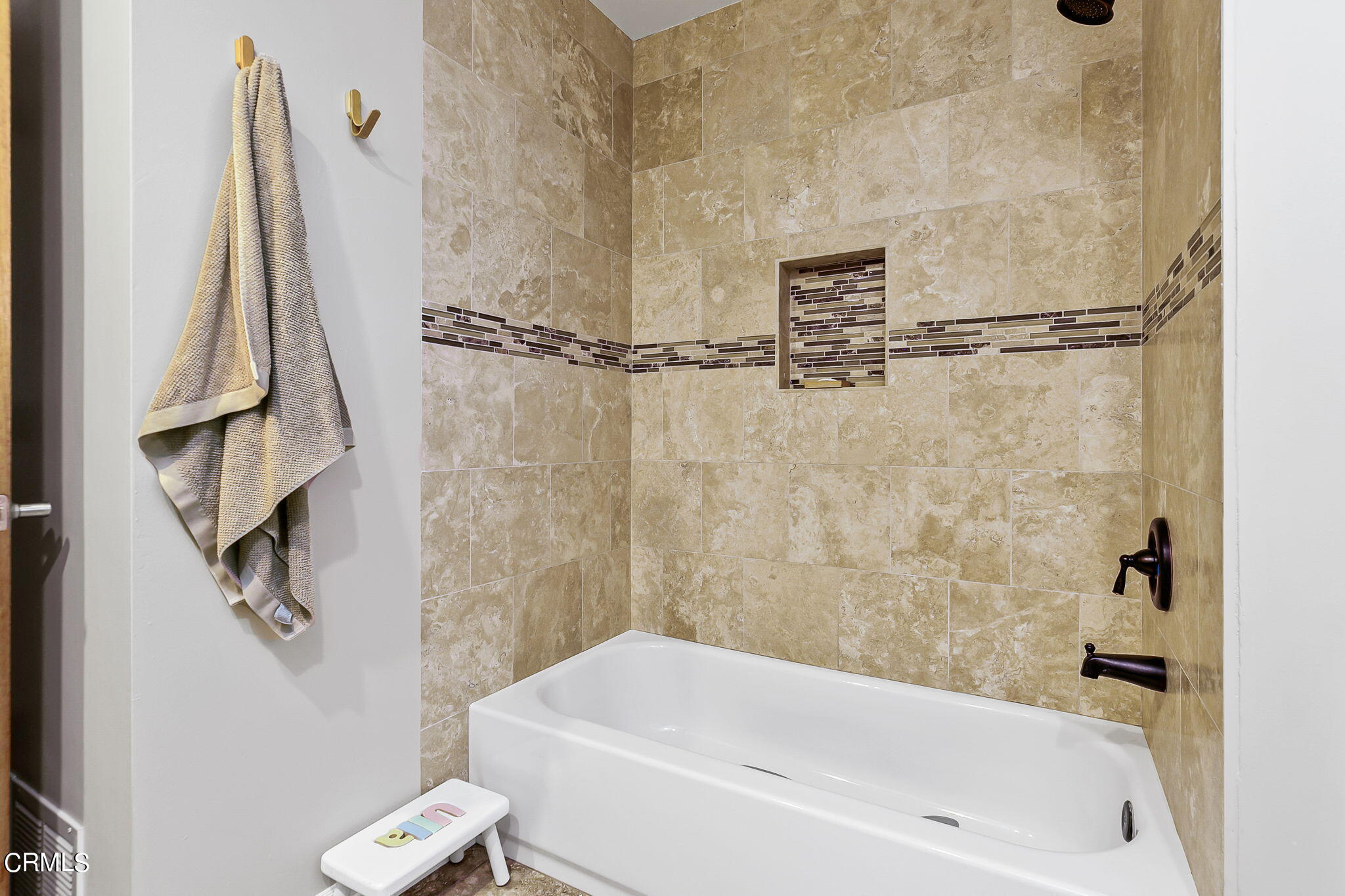 807 Daly Road Ojai, CA 93023 - Photo 30 of 50 a bath tub sitting next to a white sink and a shower