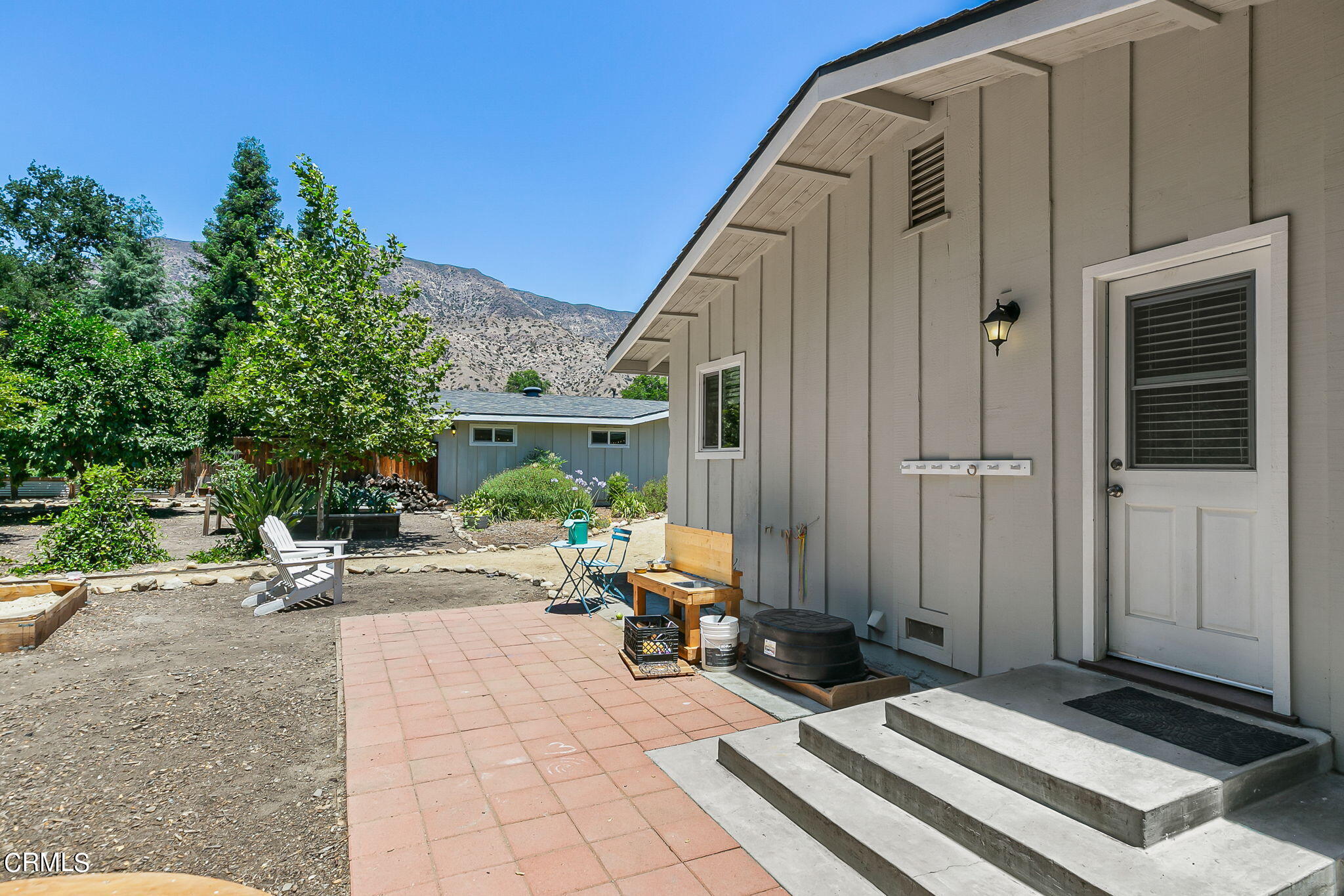 807 Daly Road Ojai, CA 93023 - Photo 38 of 50 a view of backyard with wheel chair and potted plants