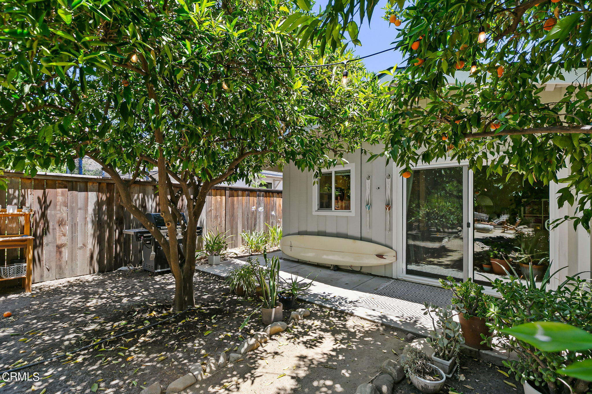 807 Daly Road Ojai, CA 93023 - Photo 44 of 50 a backyard of a house with barbeque oven table and chairs