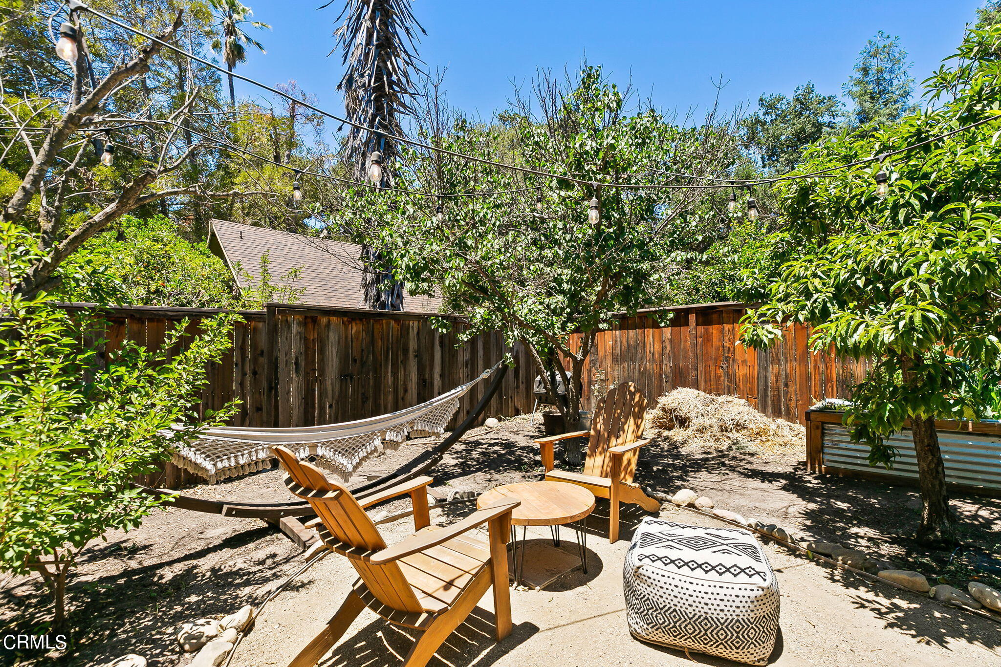 807 Daly Road Ojai, CA 93023 - Photo 50 of 50 a view of a patio with table and chairs and potted plants