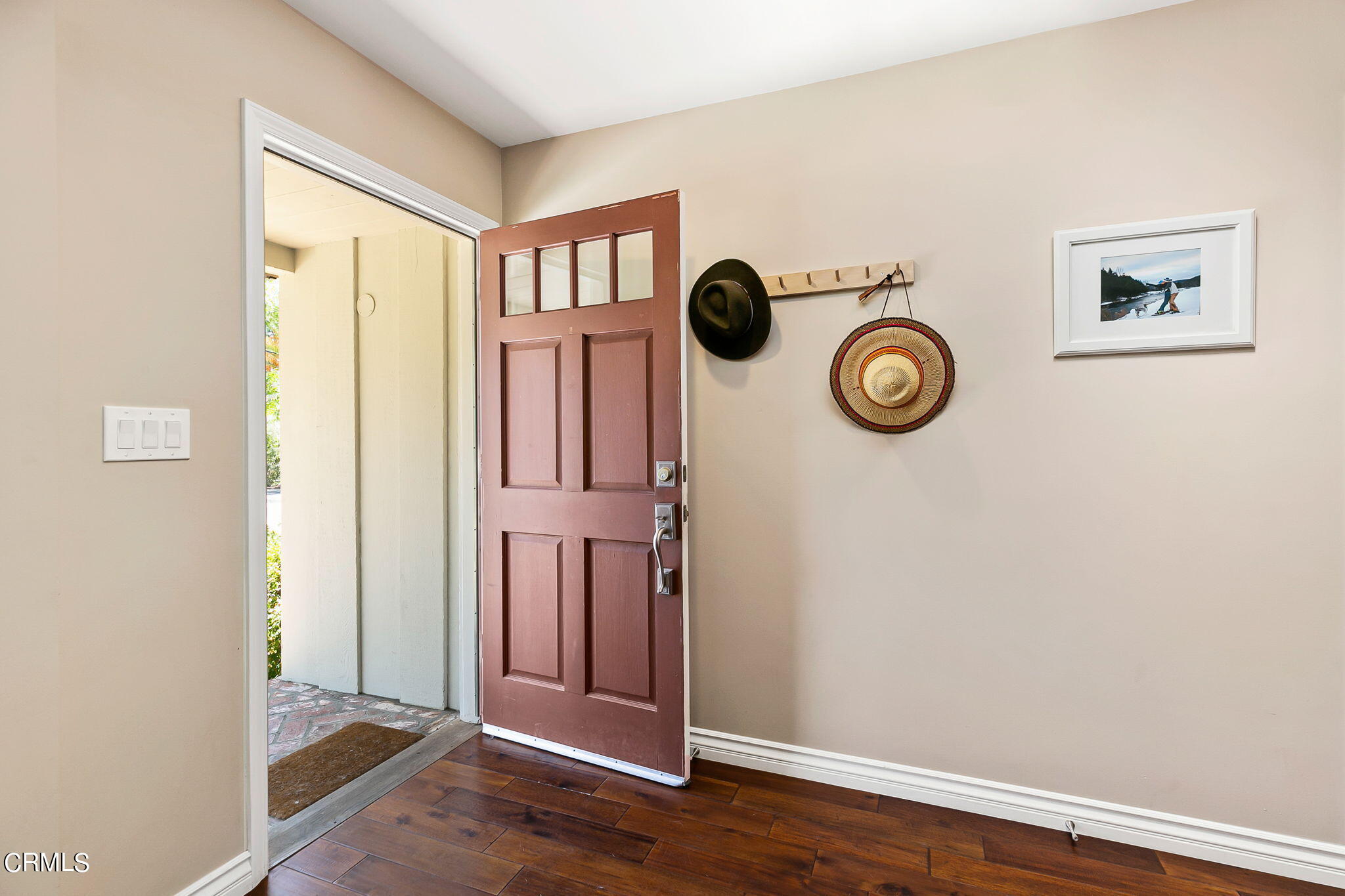 807 Daly Road Ojai, CA 93023 - Photo 7 of 50 a view of a hallway with wooden floor