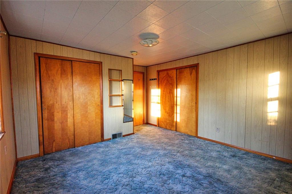 389 Story Road Export, PA 15632 - Photo 16 of 31 Main floor primary bedroom with two double closets