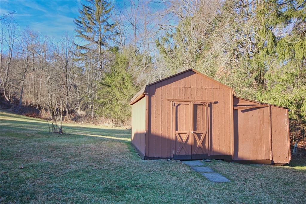 389 Story Road Export, PA 15632 - Photo 8 of 31 Large storage shed adds valuable space for tools, equipment, or hobbies