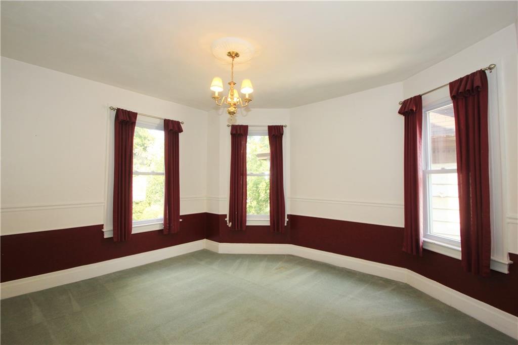 915 Malvern Road Pittsburgh, PA 15202 - Photo 15 of 23 This is one of the other bedrooms on the second floor. It has 3 large windows that provide significant light into the room.