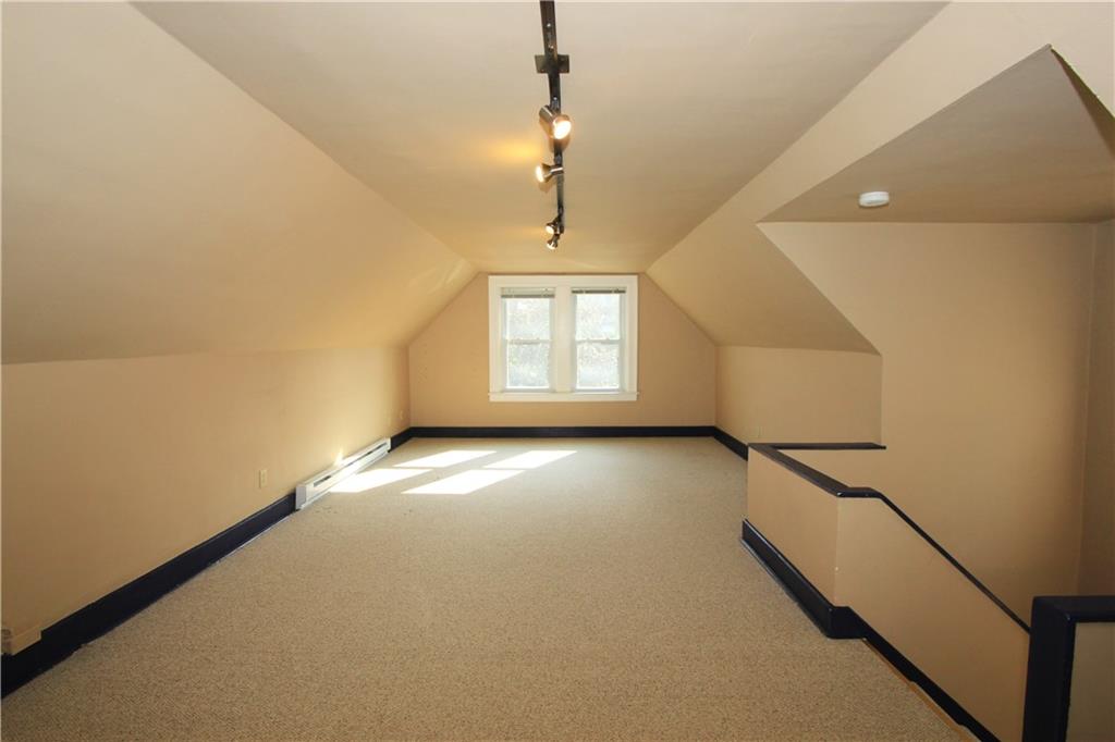 915 Malvern Road Pittsburgh, PA 15202 - Photo 6 of 23 The third floor is a large open space with neutral colored carpet and windows at either end filling the space with natural light. This room has separate baseboard heat and a window air conditioner.