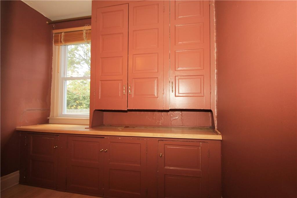 915 Malvern Road Pittsburgh, PA 15202 - Photo 10 of 23 The butlers pantry provides a significant amount of additional storage as well as some additional counter space. This space is open to the kitchen on one side and the dining room on the other - very convenient!