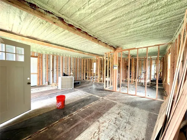 a view of a room with windows