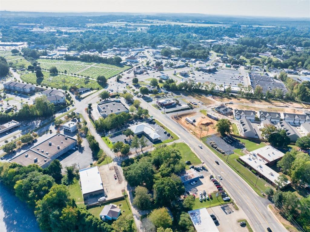 593 Shallowford Road Gainesville, GA 30504 - Photo 10 of 14 an aerial view of residential houses with outdoor space