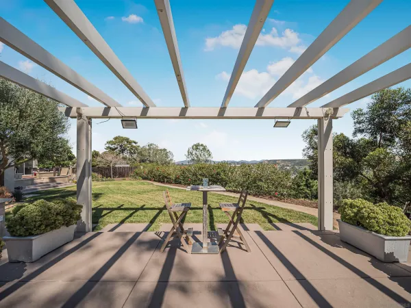 a kitchen with granite countertop a stove and a refrigerator