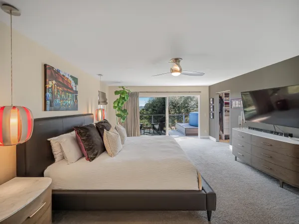 a workspace with wooden floor and white walls