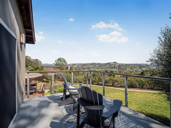 a bathroom with a double vanity sink toilet and shower