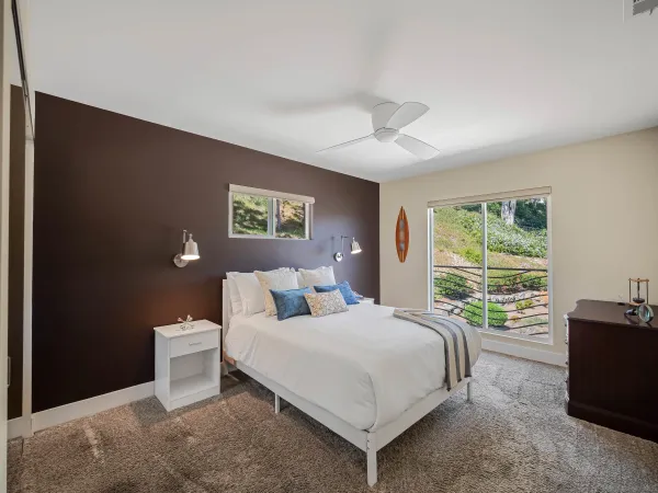 a view of a swimming pool with a yard