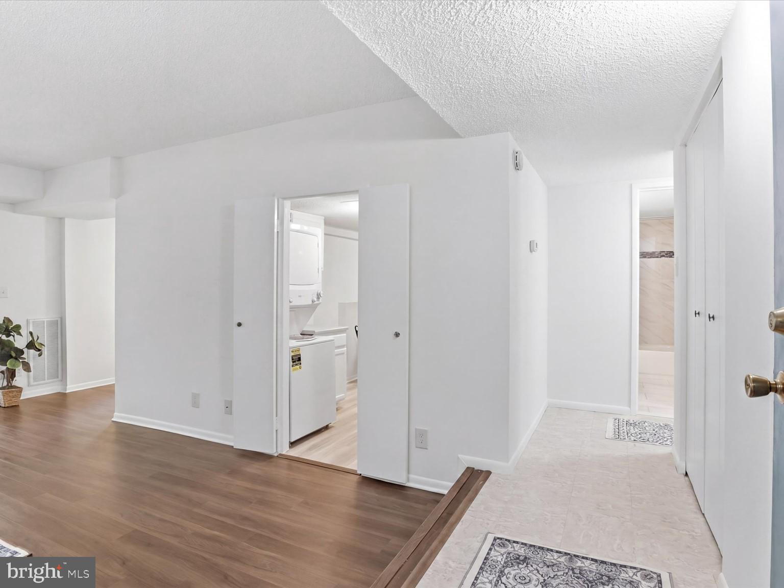 11809 Breton Court, Unit 2B Reston, VA 20191 - Photo 15 of 29 an empty room with wooden floor
