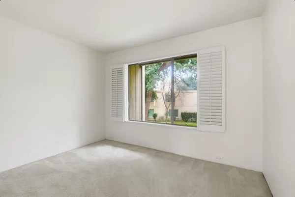 an empty room with a window