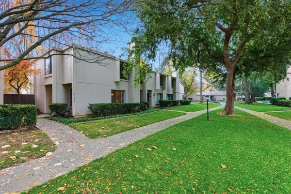 a house view with a garden space