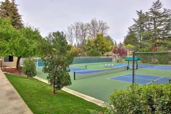 a view of balcony and yard