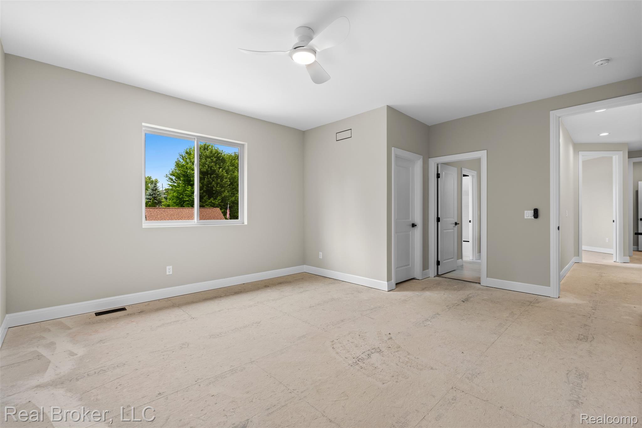 12114 22 Mile Road Utica, MI 48315 - Photo 44 of 70 Recessed lighting, ceiling fan, neutral wall tones, white trim, and multiple doorways