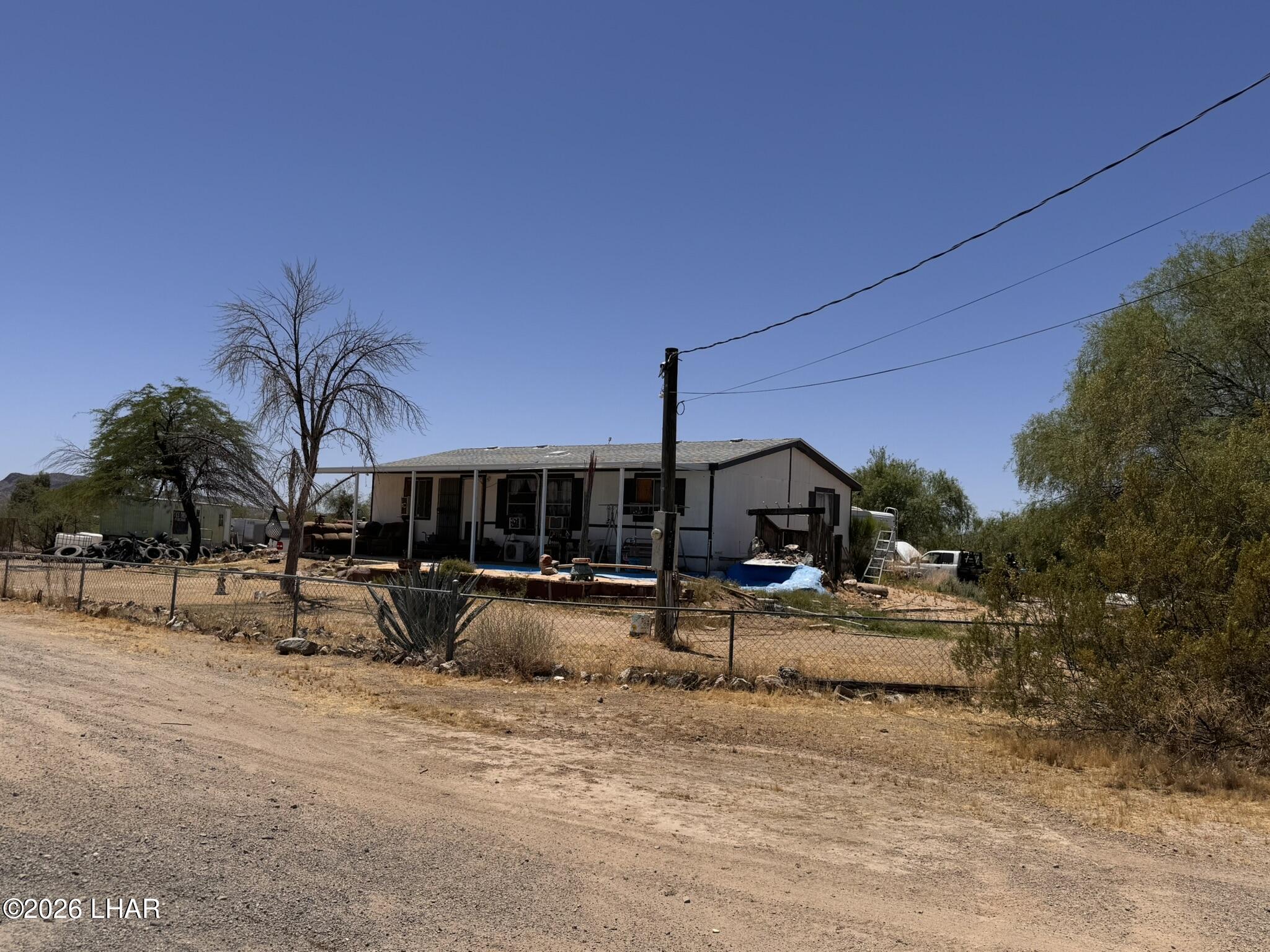 69896 Salome Road Salome, AZ 85348 - Photo 19 of 19 a view of a house with snow yard