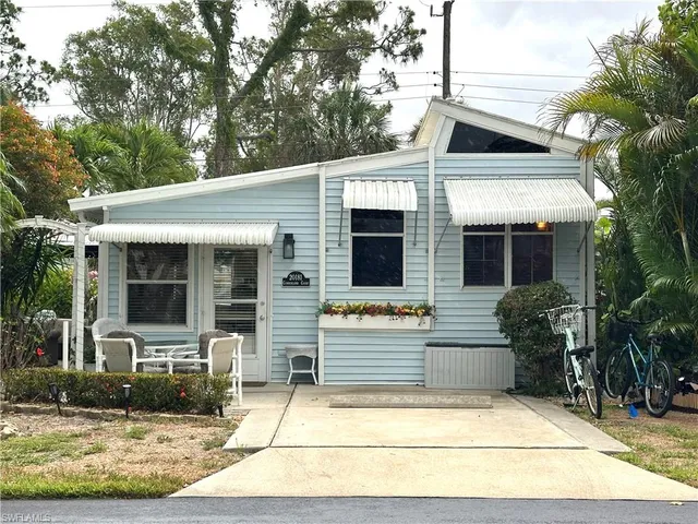 a front view of a house with porch