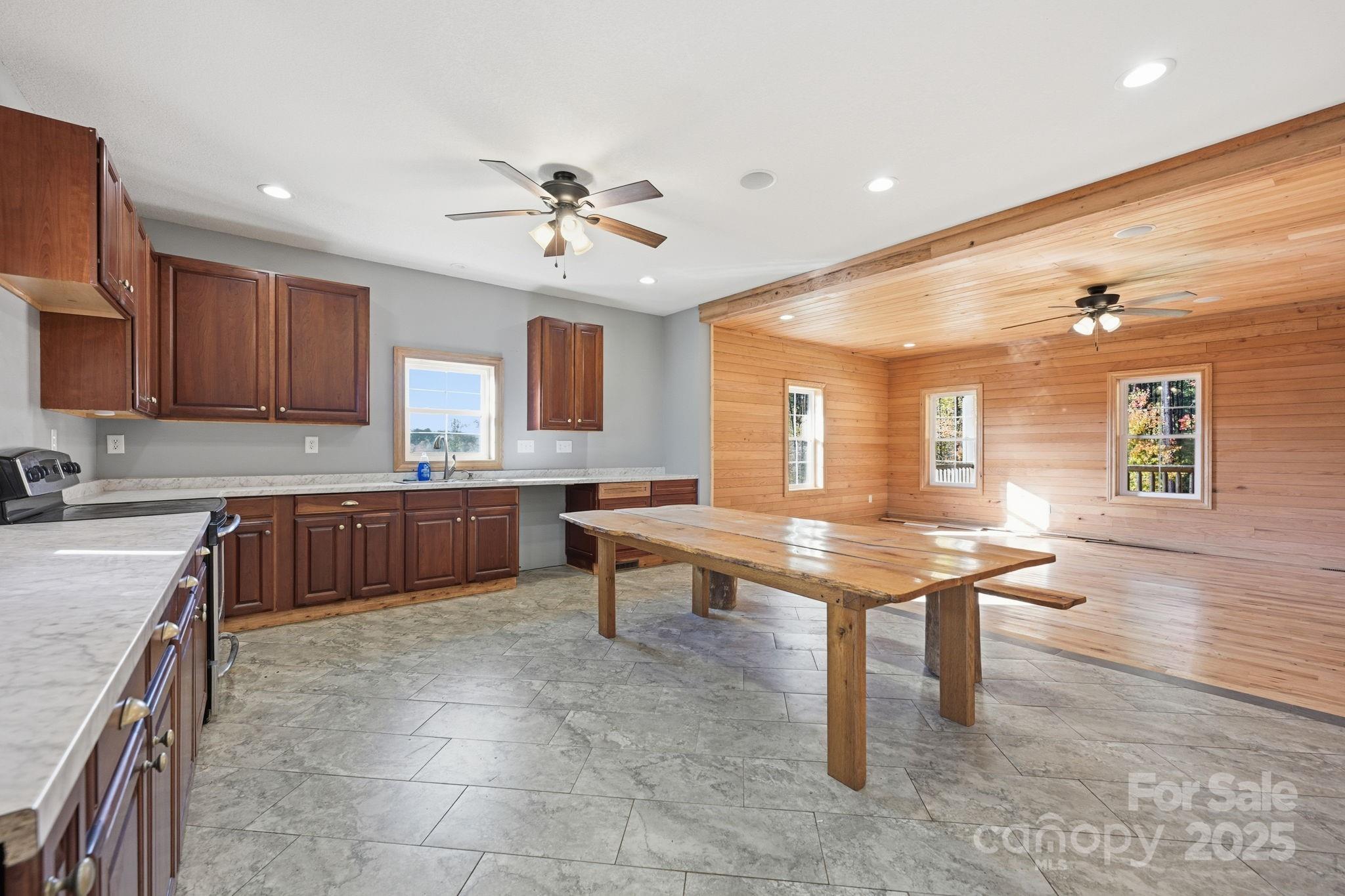 365 Kepley Road Salisbury, NC 28147 - Photo 14 of 48 a large kitchen with kitchen island a sink stainless steel appliances and cabinets
