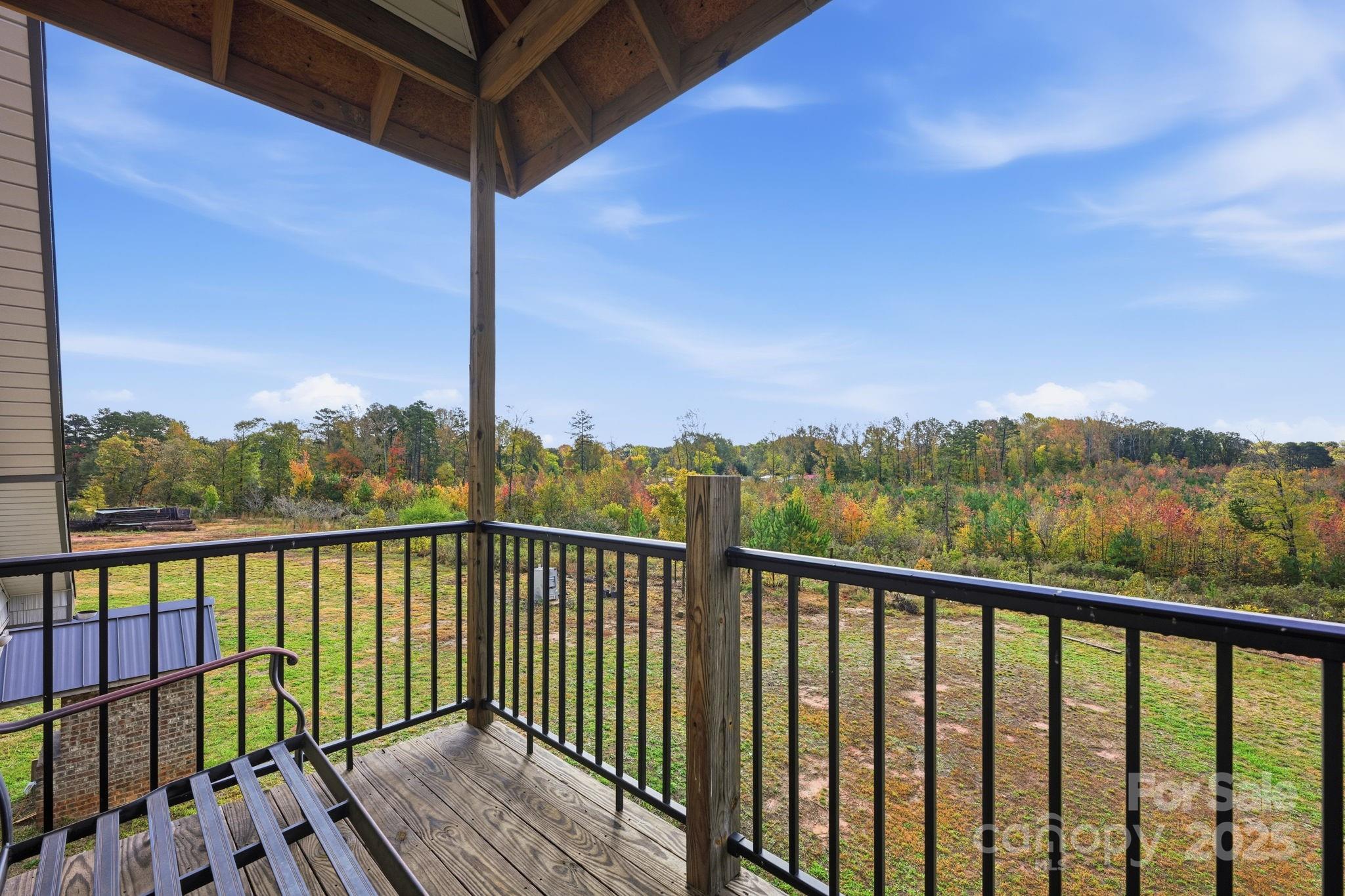 365 Kepley Road Salisbury, NC 28147 - Photo 20 of 48 a view of a balcony with wooden fence