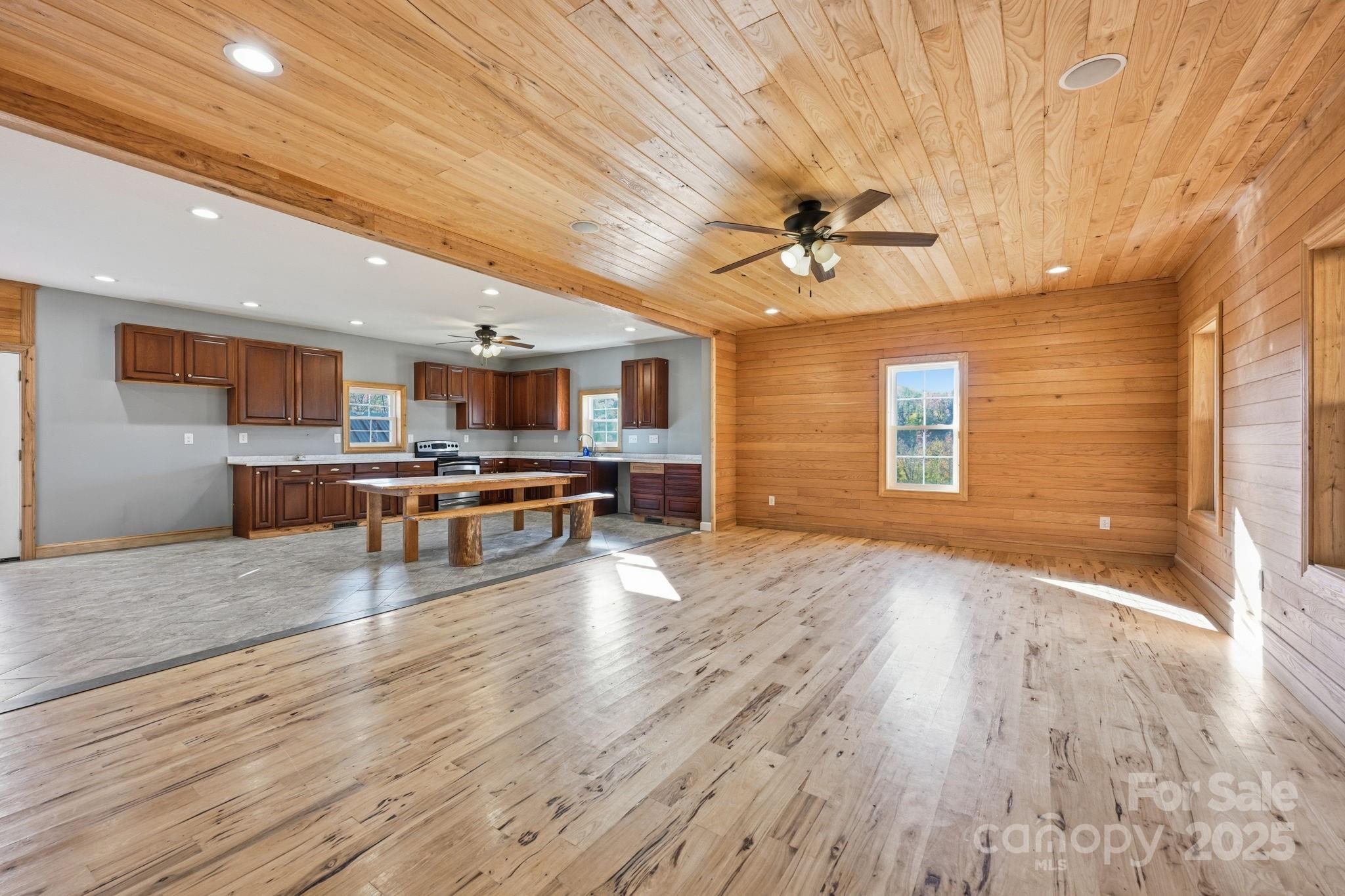 365 Kepley Road Salisbury, NC 28147 - Photo 24 of 48 a view of kitchen with stove and wooden floor