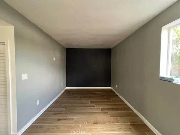a view of an empty room and window