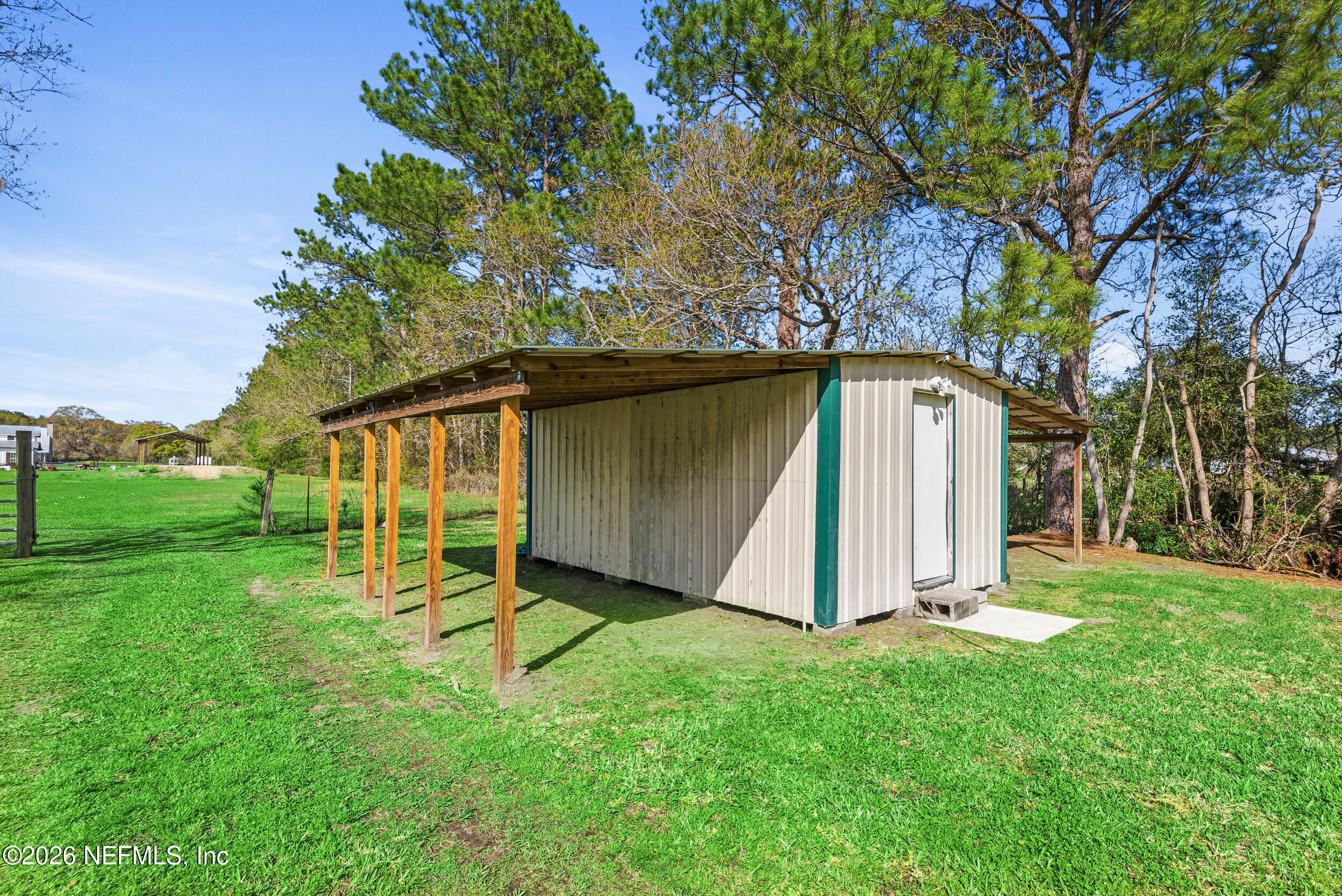 55097 Sugar Loaf Lane Callahan, FL 32011 - Photo 24 of 25 Shed with Covered areas