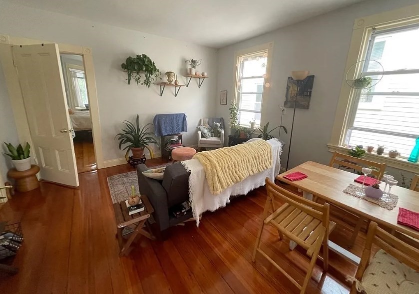 787 Boylston Street, Unit 3 Brookline, MA 02467 - Photo 2 of 11 a bedroom with bed and wooden floor