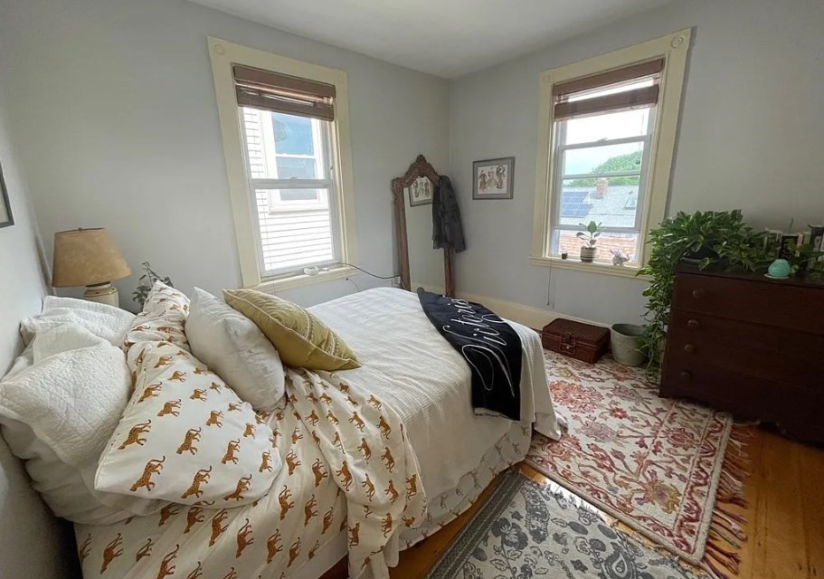 787 Boylston Street, Unit 3 Brookline, MA 02467 - Photo 3 of 11 a bedroom with a bed and a window
