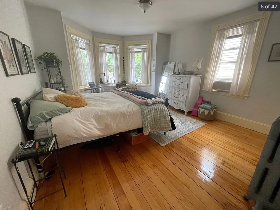 787 Boylston Street, Unit 3 Brookline, MA 02467 - Photo 5 of 11 a bedroom with bed and window