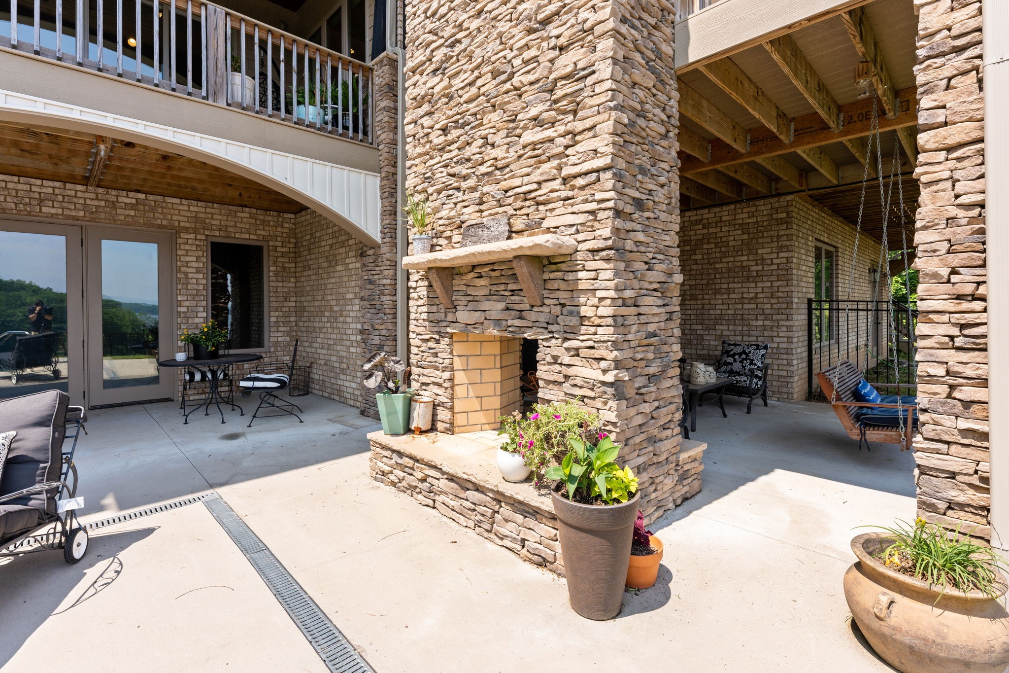 236 Beech Hill Drive Winchester, TN 37398 - Photo 20 of 70 a view of a patio with dining table and chairs and potted plants