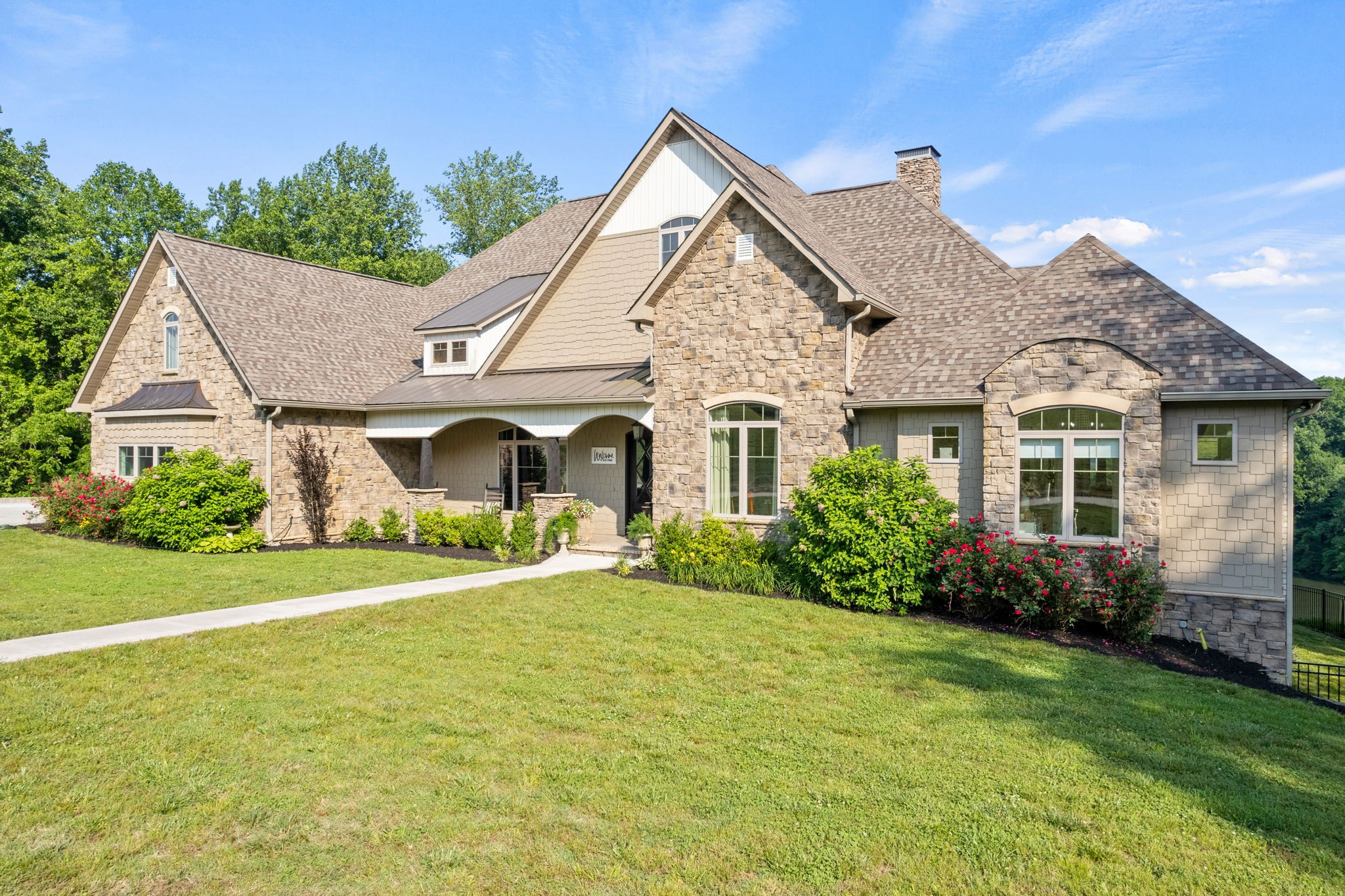 236 Beech Hill Drive Winchester, TN 37398 - Photo 2 of 70 a front view of a house with garden