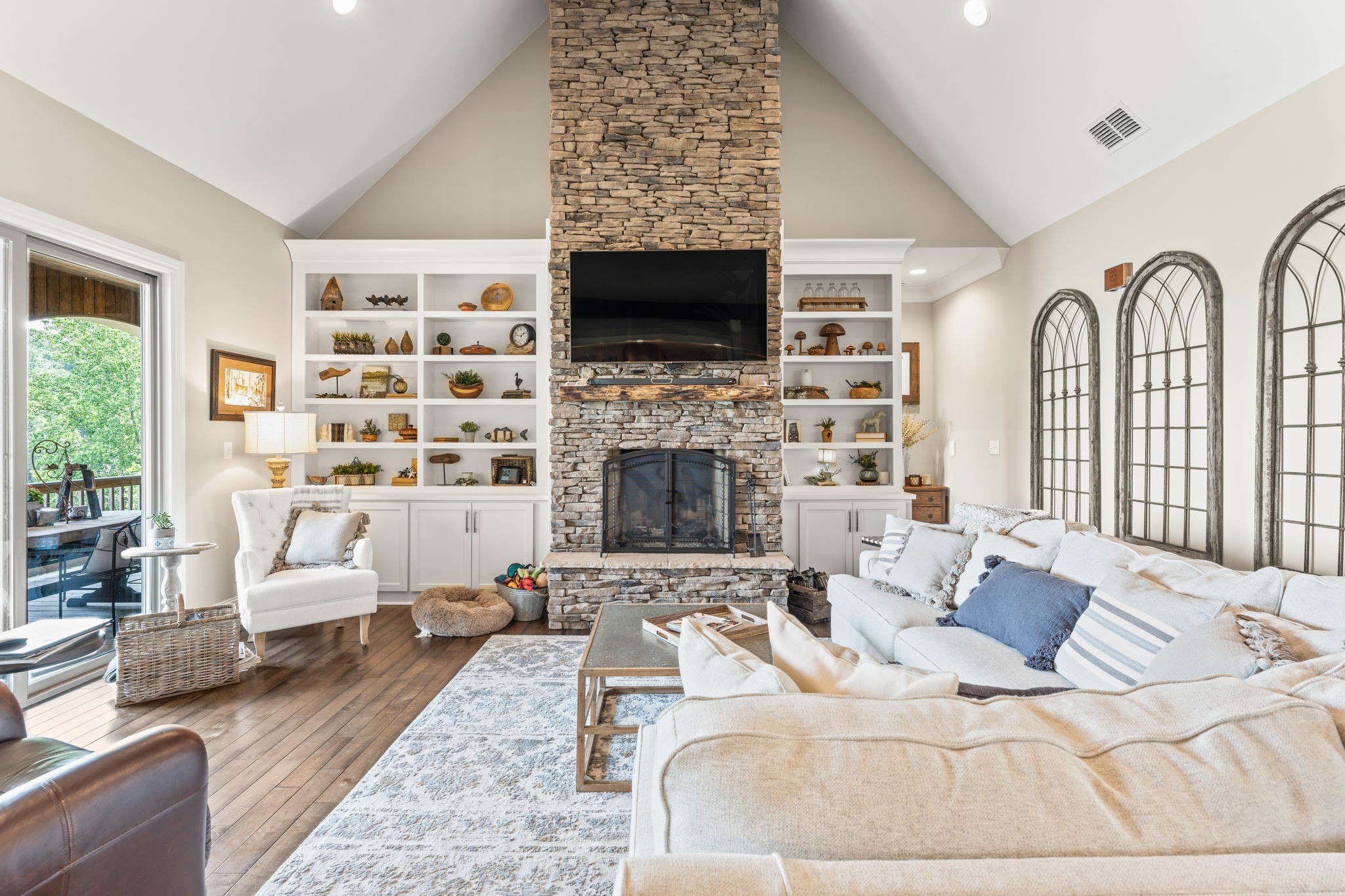 236 Beech Hill Drive Winchester, TN 37398 - Photo 40 of 70 a living room with furniture a fireplace and a flat screen tv