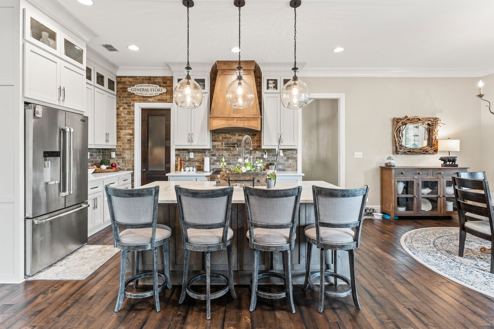 236 Beech Hill Drive Winchester, TN 37398 - Photo 41 of 70 a view of dining room and livingroom with furniture wooden floor a chandelier