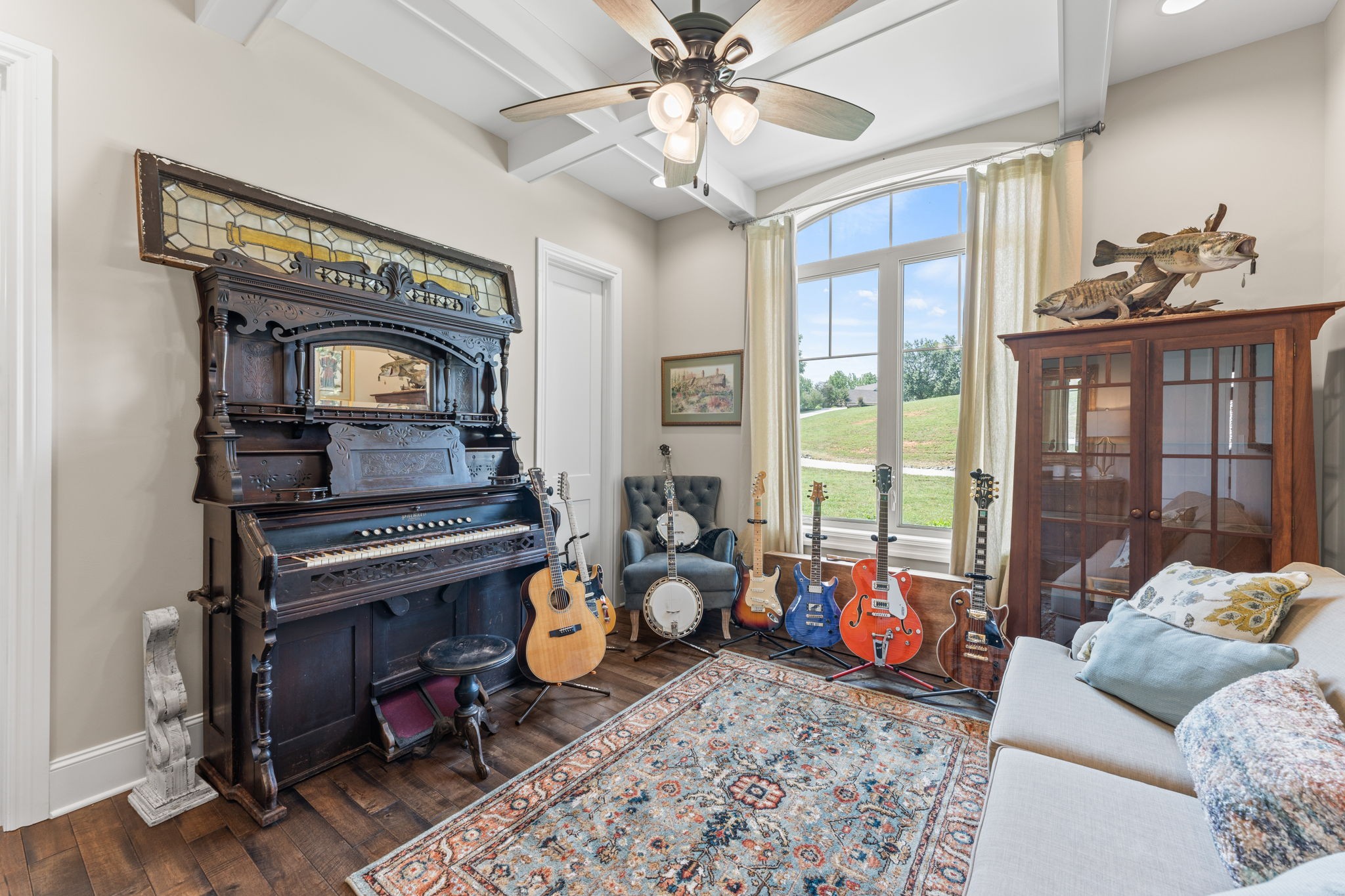 236 Beech Hill Drive Winchester, TN 37398 - Photo 54 of 70 a living room with furniture a window and a chandelier