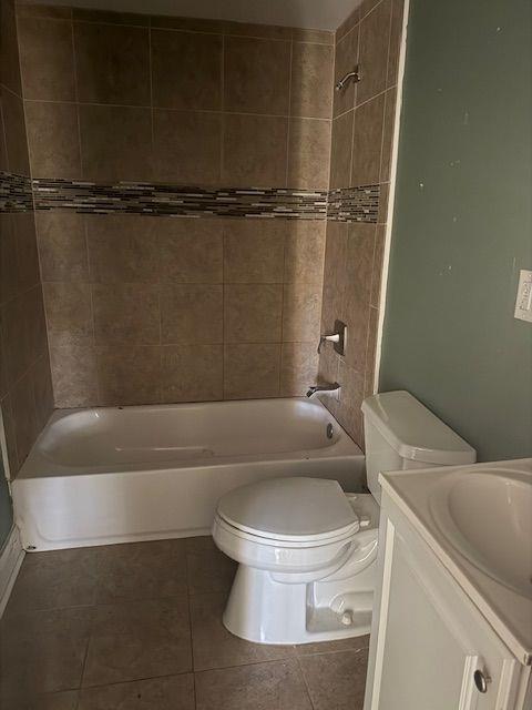 5715 Harding Drive Mableton, GA 30126 - Photo 8 of 13 a white toilet sitting next to a bath tub